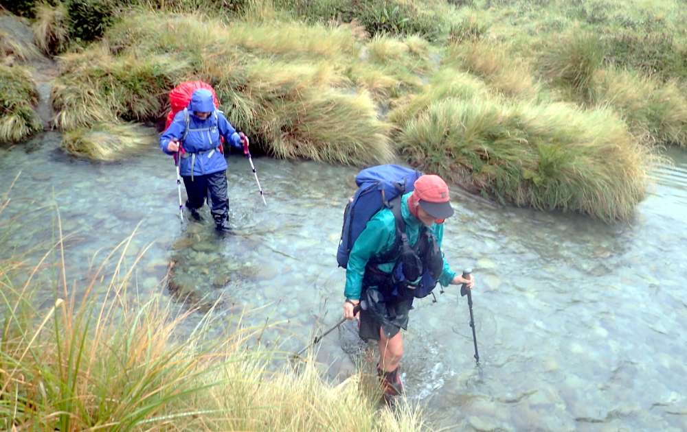 P3071984+Wet+boots+crossing+a+tributary+of+Rock+Burn.JPG